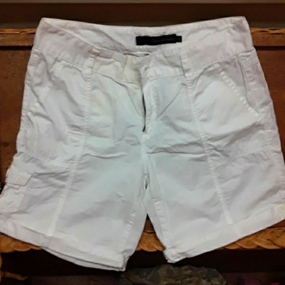 White Calvin Klein Shorts. I say they are unisex too because i wore them too!
